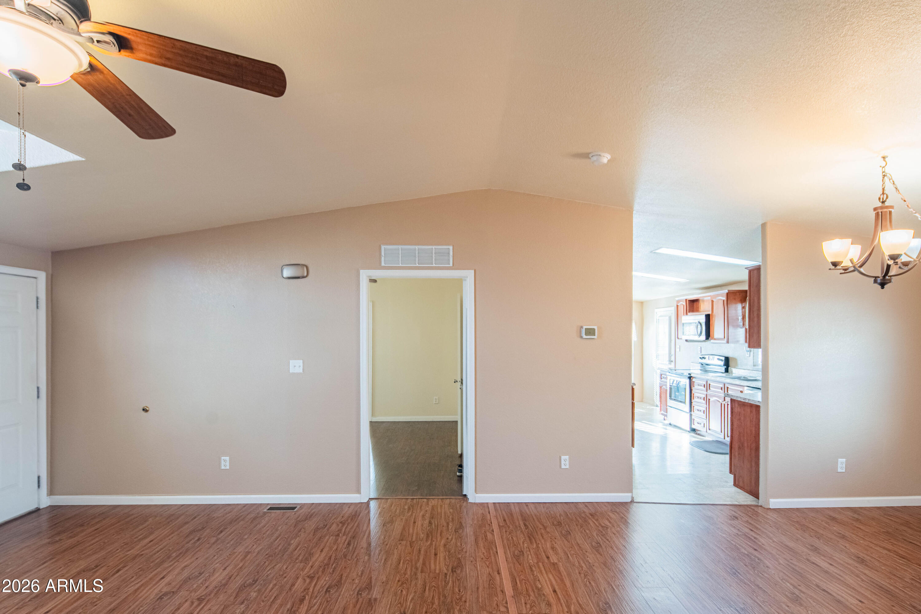 633 South 87th Place Mesa, AZ 85208 - Photo 42 of 55 a view of a room with wooden floor