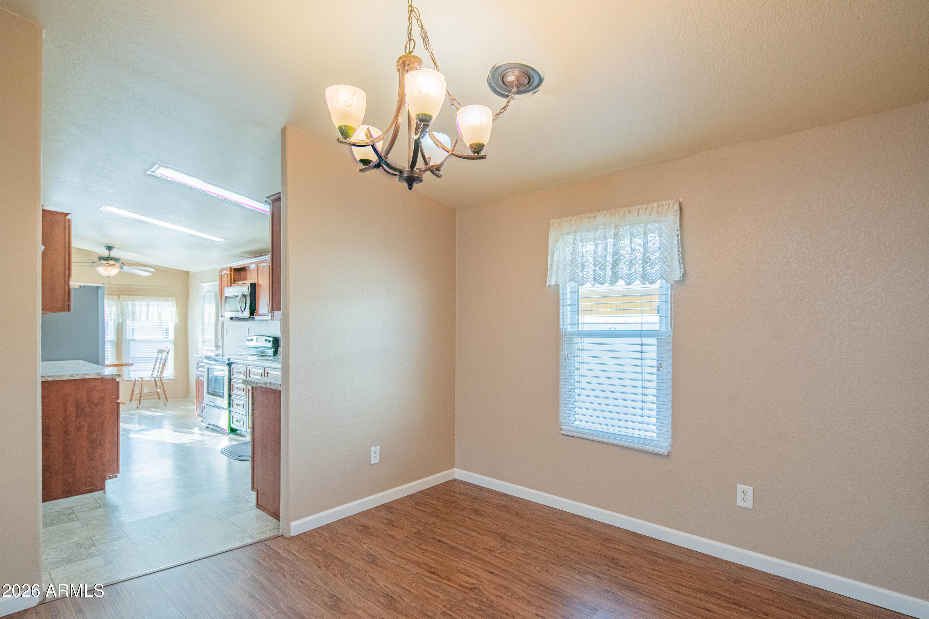 633 South 87th Place Mesa, AZ 85208 - Photo 43 of 55 a view of a room with wooden floor and windows