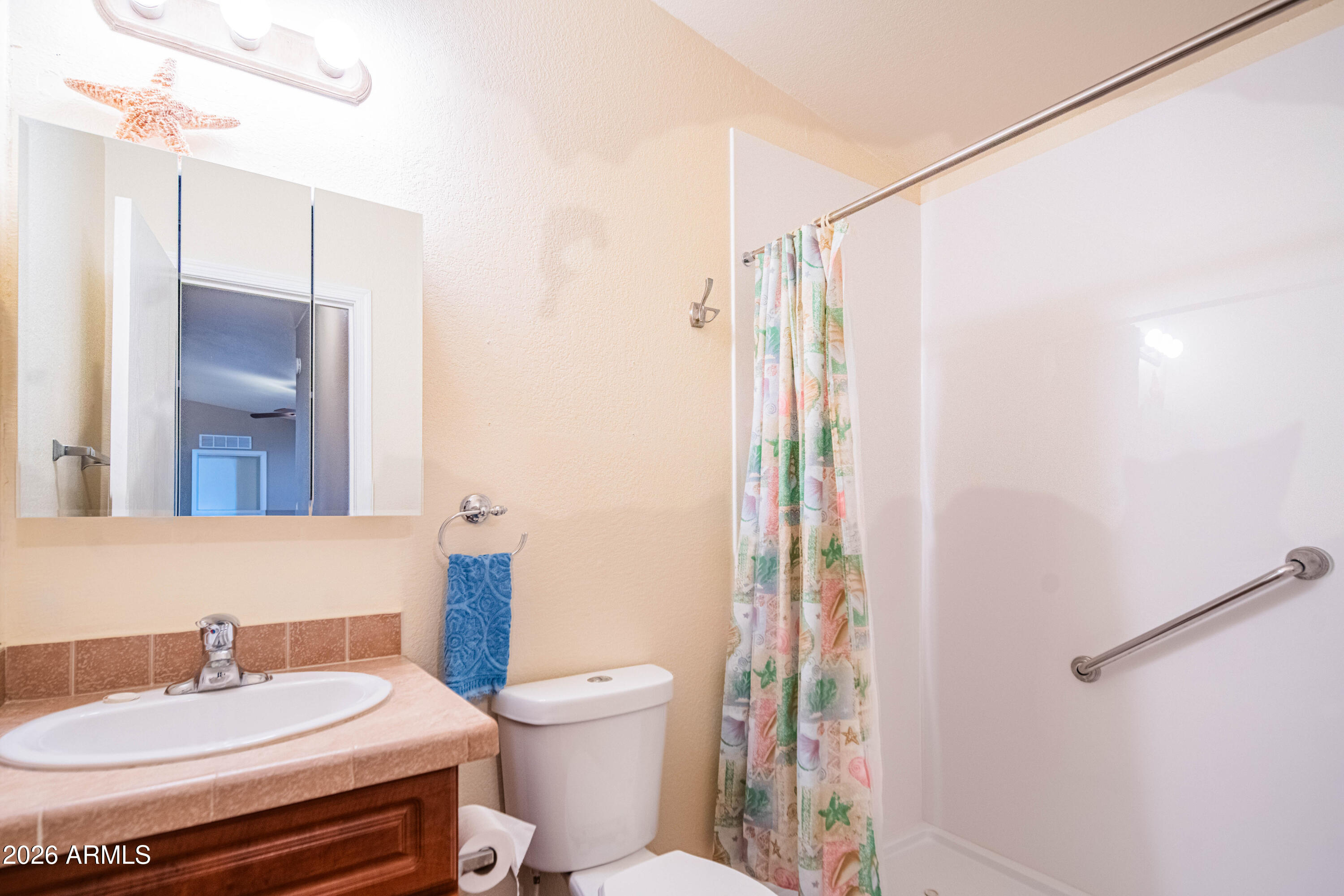 633 South 87th Place Mesa, AZ 85208 - Photo 53 of 55 a bathroom with a sink toilet and shower