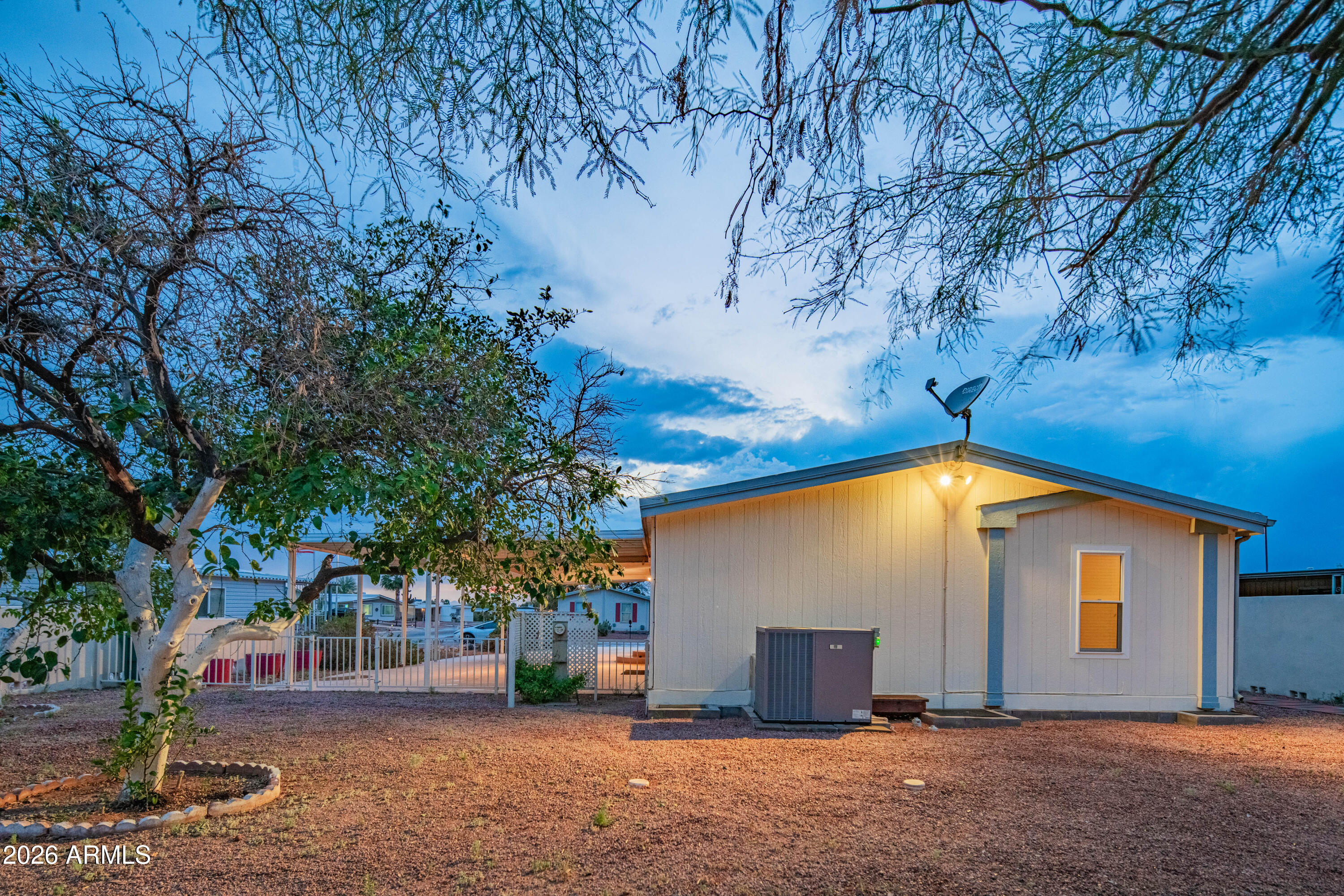 633 South 87th Place Mesa, AZ 85208 - Photo 7 of 55 a house with trees in front of it