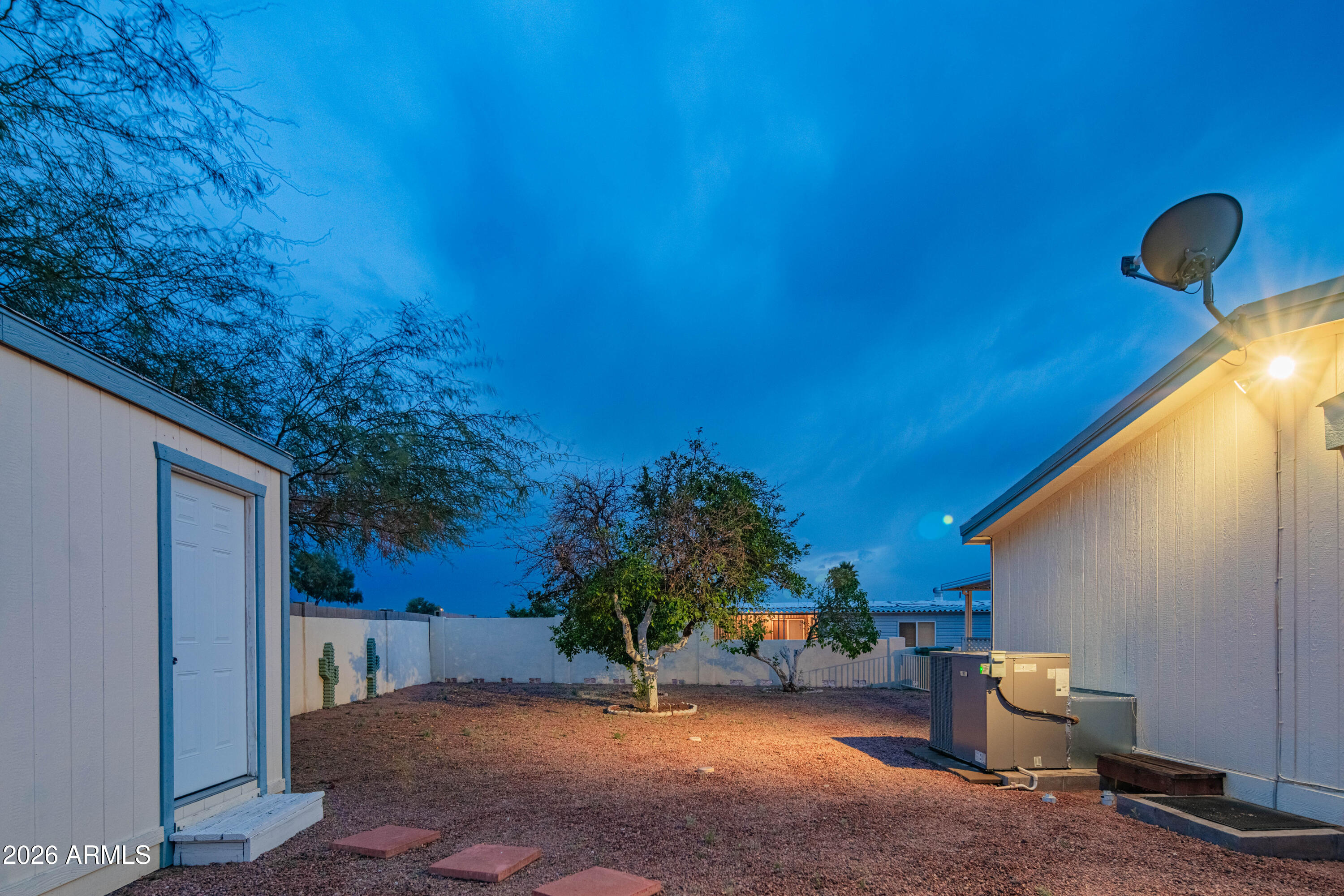 633 South 87th Place Mesa, AZ 85208 - Photo 9 of 55 a view of a backyard with a tree