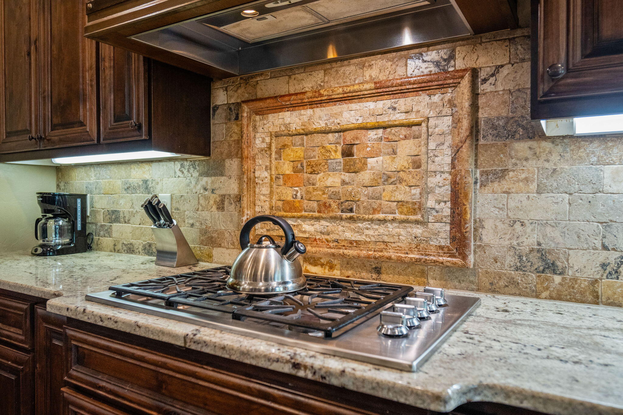 56508 Dancing Rock Loop, Unit 22 Bend, OR 97707 - Photo 23 of 69 a kitchen with a stove