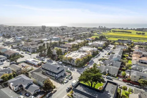 an aerial view of a city with lots of residential buildings