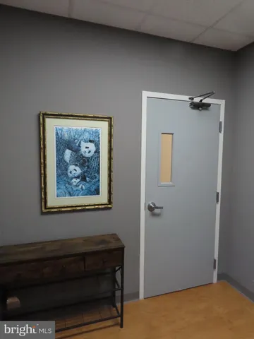 a view of a hallway with closet