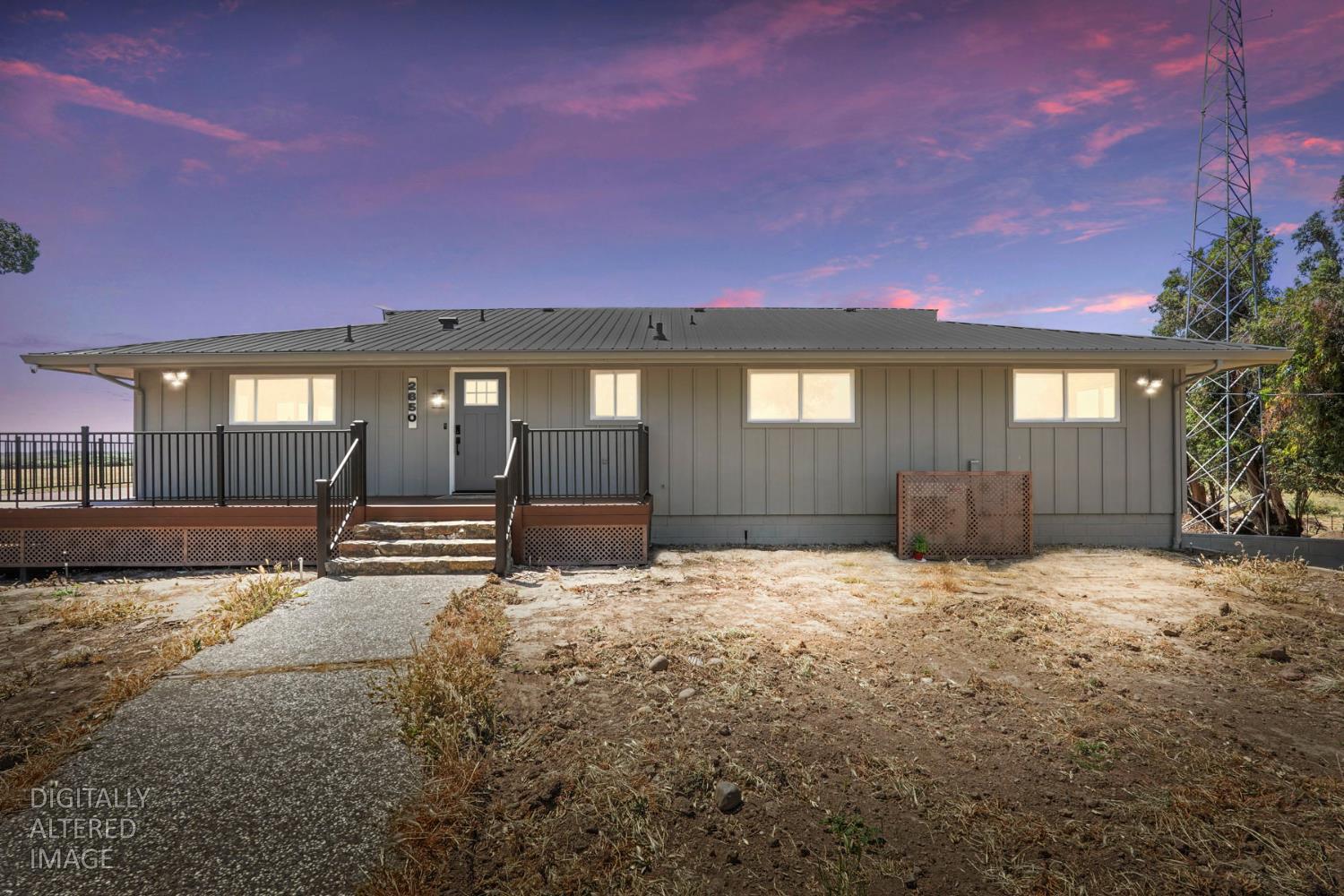 2650 West Twitchell Island Road Rio Vista, CA 94571 - Photo 2 of 60 a view of a house with backyard and a yard