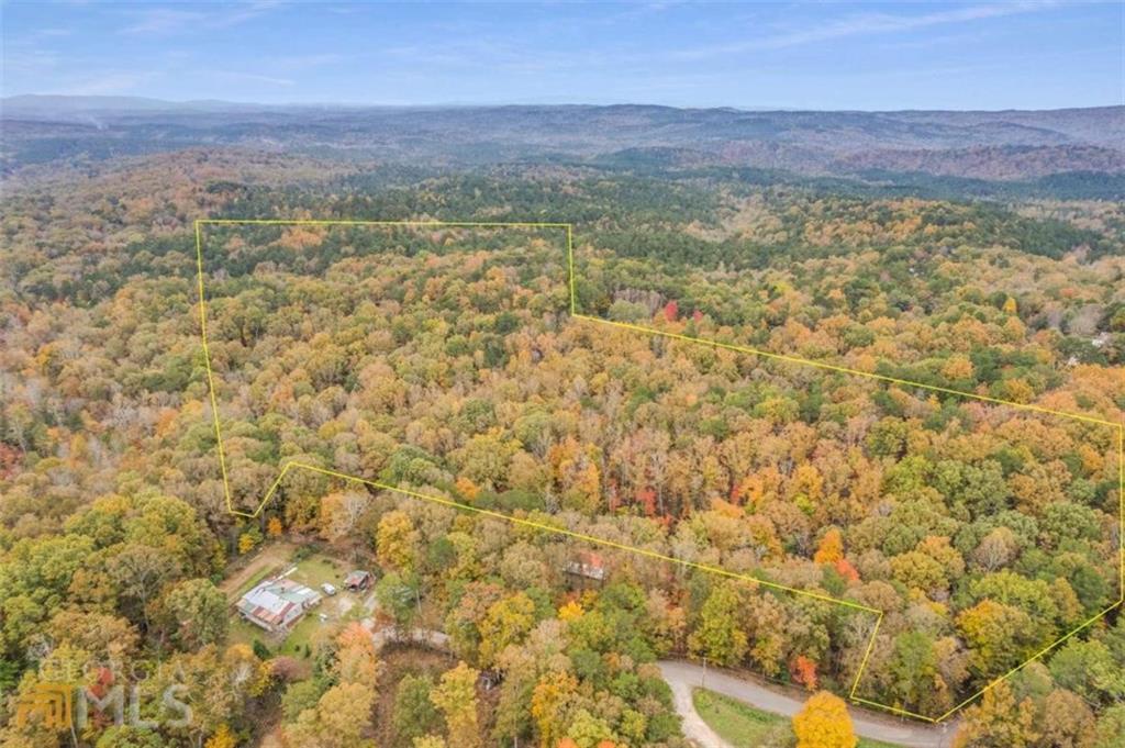 0 Old Federal Road Talking Rock, GA 30175 - Photo 2 of 2 a view of a city with lush green forest