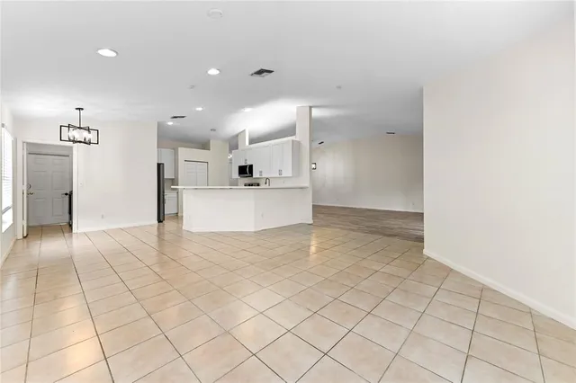 a view of a kitchen and a window