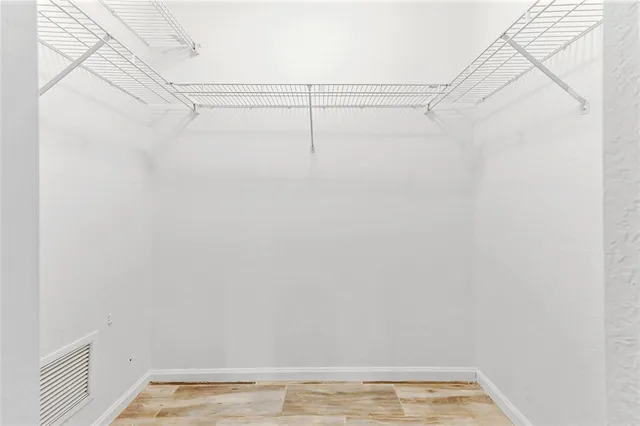 a view of a room with racks on the wall