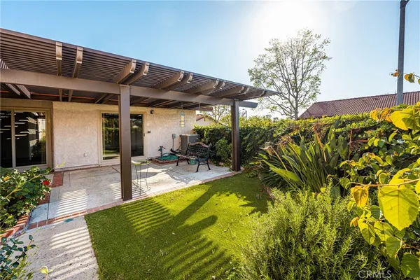 a view of swimming pool with a patio