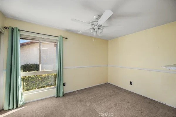 a view of a room with drop ceiling
