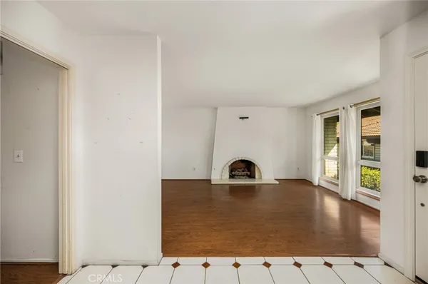 a view of a living room with a rug