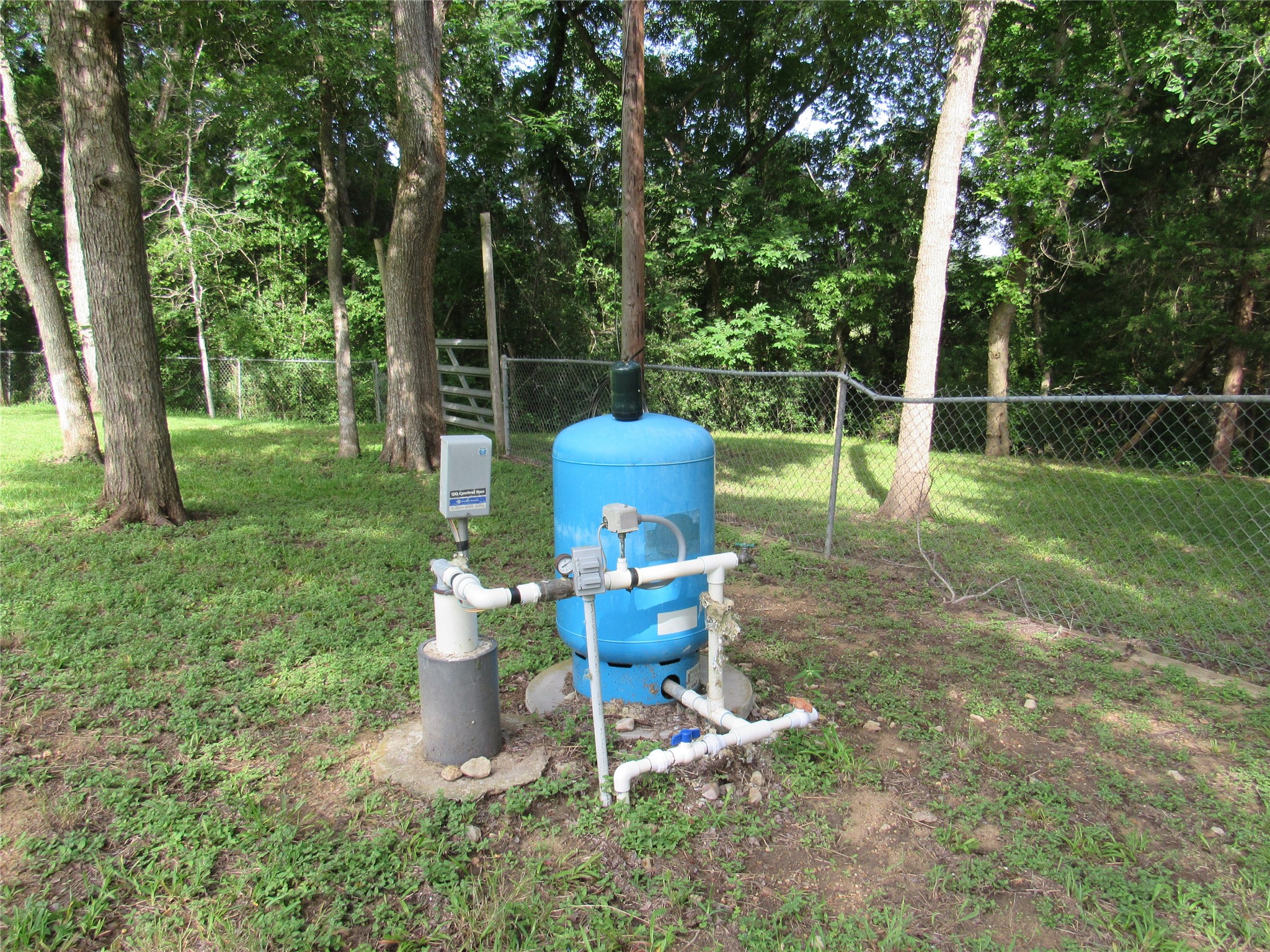 9491 Rocky Road Bellville, TX 77418 - Photo 14 of 19 a view of a chair and table in the garden