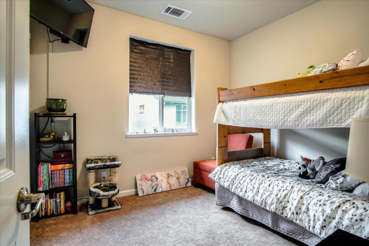 108 Springtime Circle Hollister, CA 95023 - Photo 14 of 36 a bedroom with a bed and a window