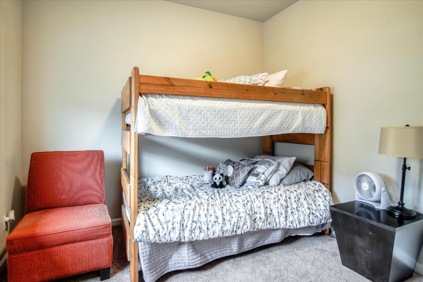 108 Springtime Circle Hollister, CA 95023 - Photo 15 of 36 a bedroom with a bed and a couch