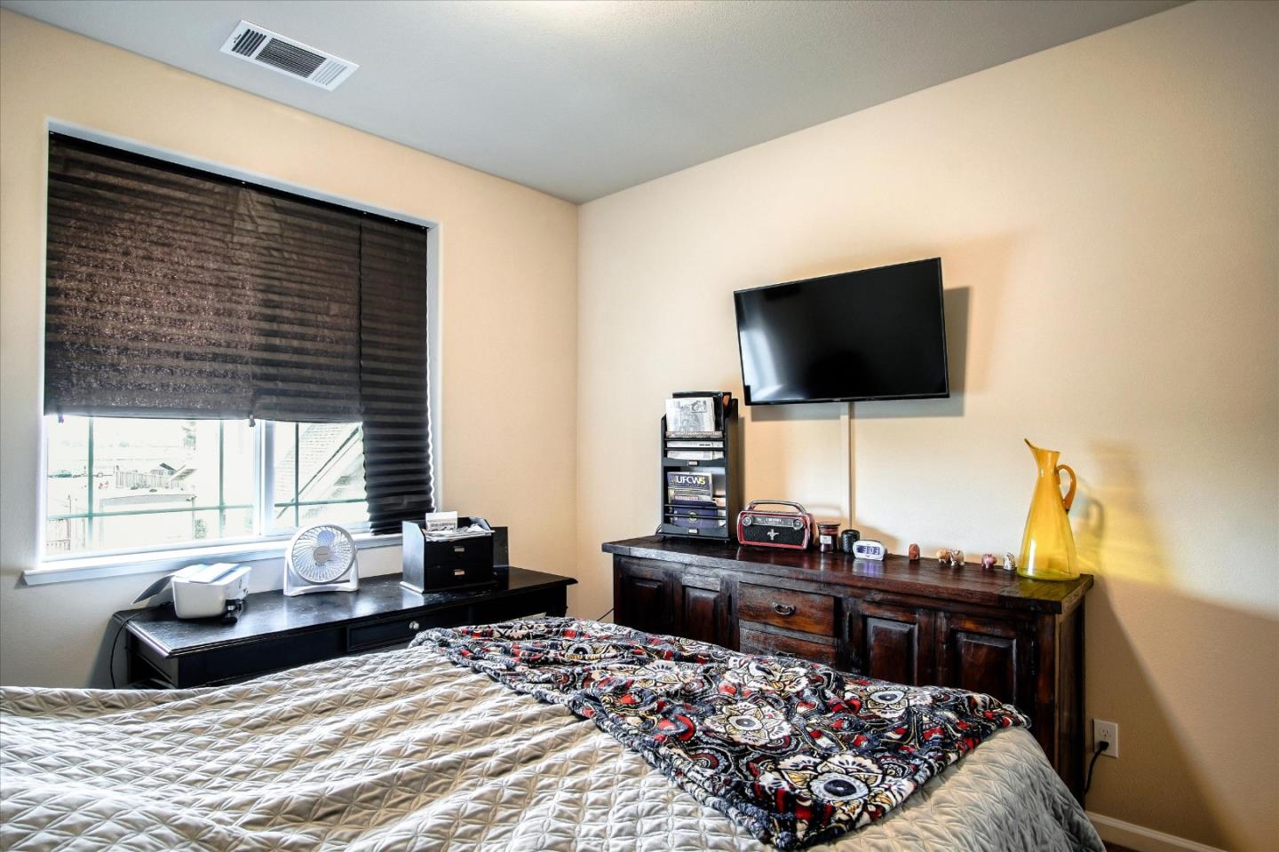 108 Springtime Circle Hollister, CA 95023 - Photo 16 of 36 a living room with furniture and a flat screen tv