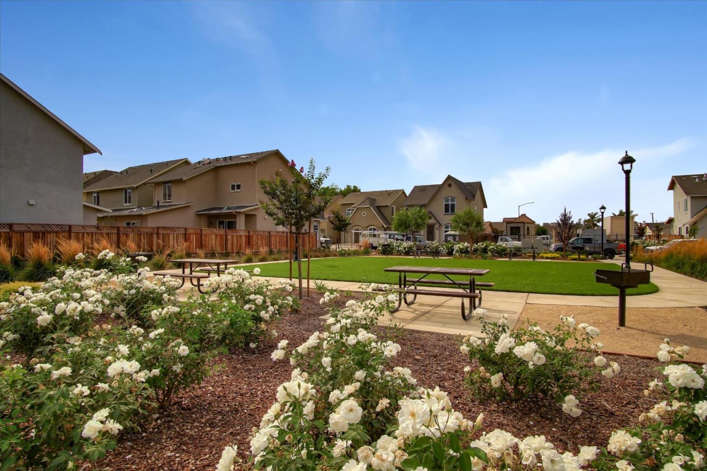 108 Springtime Circle Hollister, CA 95023 - Photo 28 of 36 a view of a bench in front of house