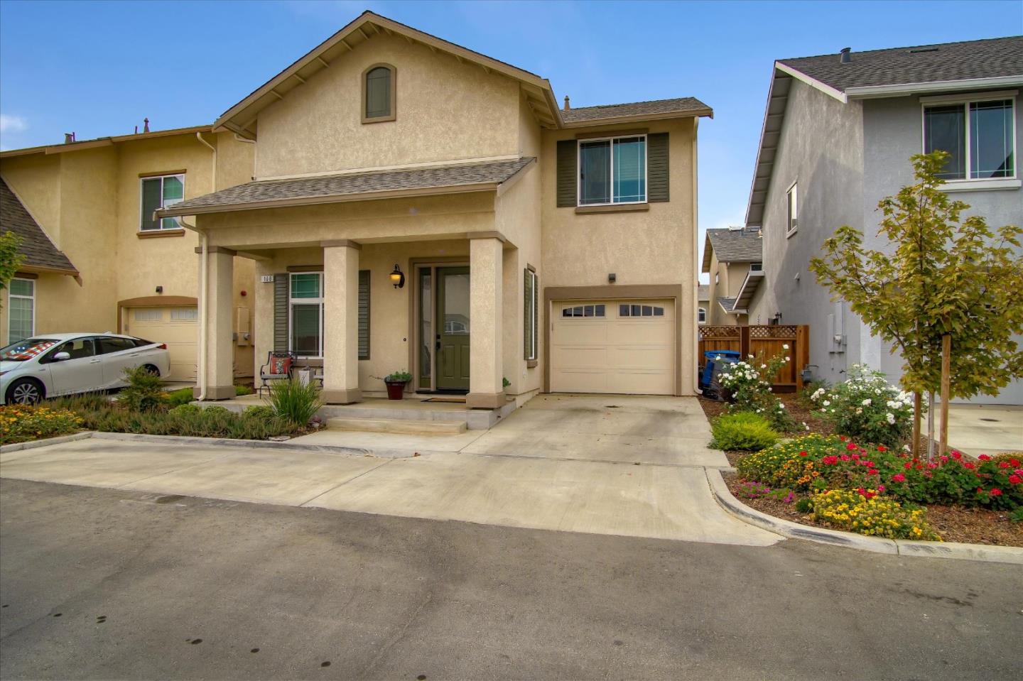 108 Springtime Circle Hollister, CA 95023 - Photo 29 of 36 a front view of a house with a yard and garage