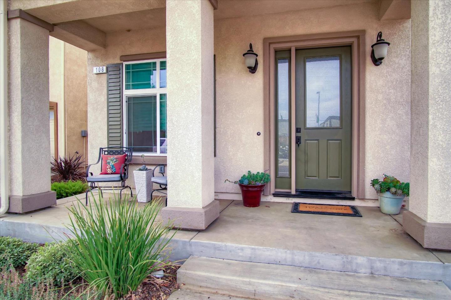 108 Springtime Circle Hollister, CA 95023 - Photo 31 of 36 a living room filled with furniture and potted plant