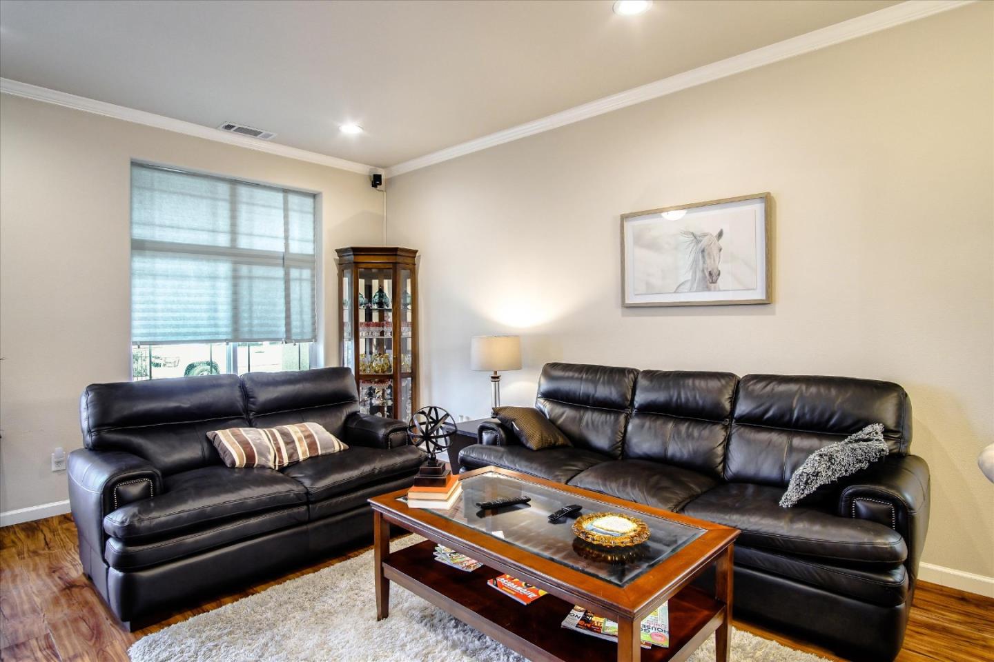 108 Springtime Circle Hollister, CA 95023 - Photo 35 of 36 a living room with furniture and a couch