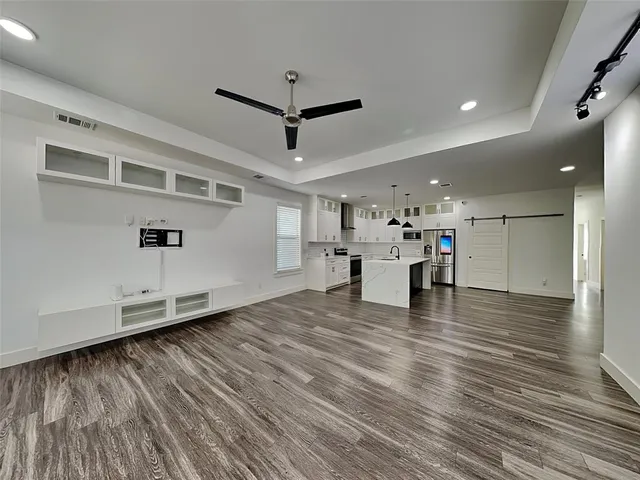 a view of a livingroom with a flat screen tv