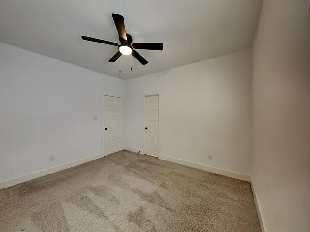 a view of a big room with wooden floor