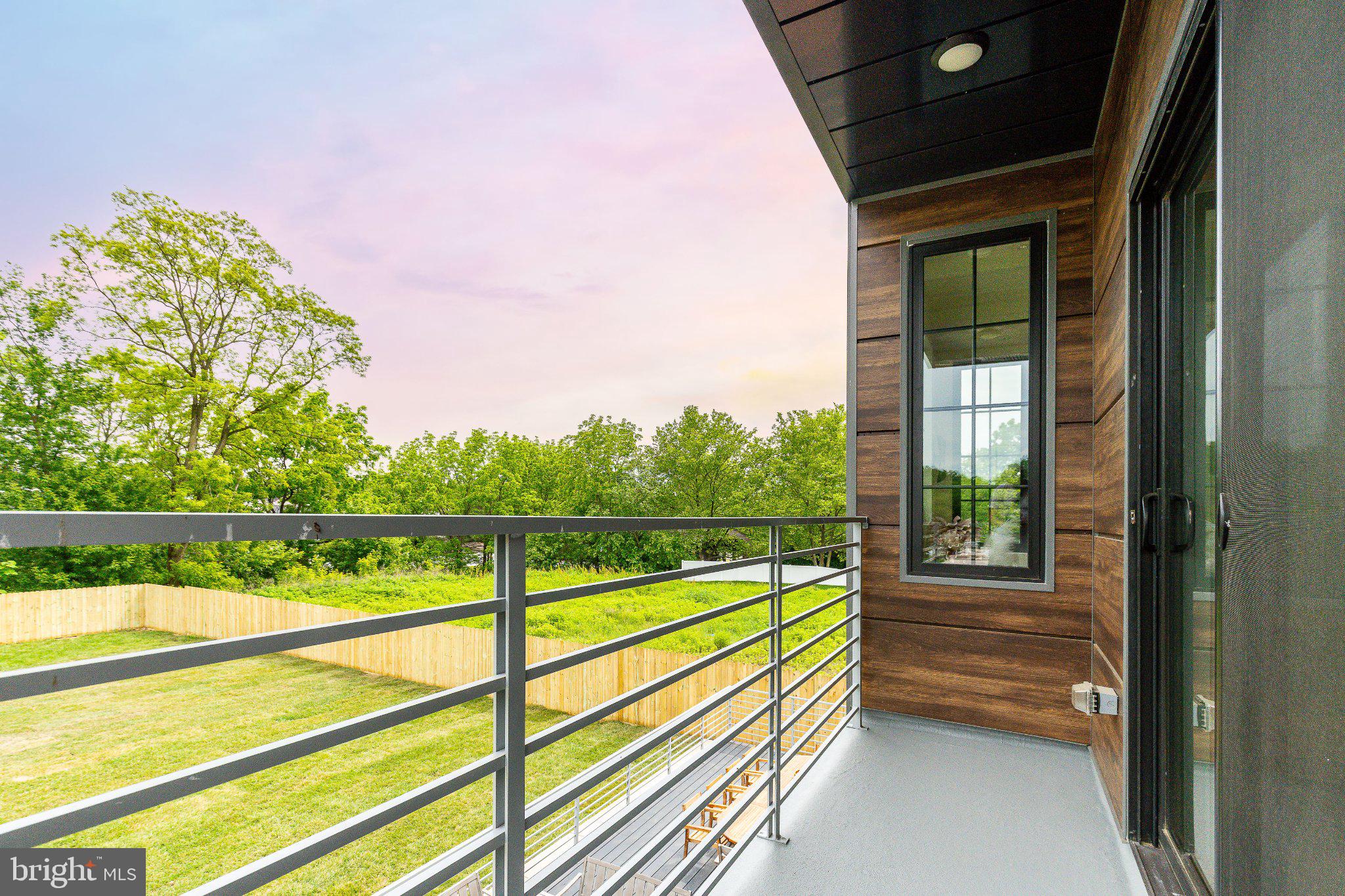 9739 Krewstown Road Philadelphia, PA 19115 - Photo 40 of 84 Serene balcony with lush views.