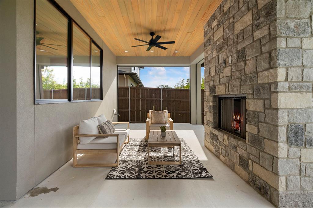 3316 Ferguson Road Grapevine, TX 76092 - Photo 35 of 39 a living room with furniture and a fireplace
