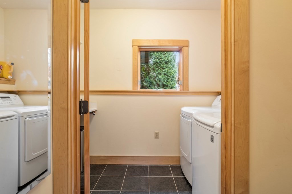 62 Buffam Road Pelham, MA 01002 - Photo 28 of 42 a view of storage and utility room with washer and dryer