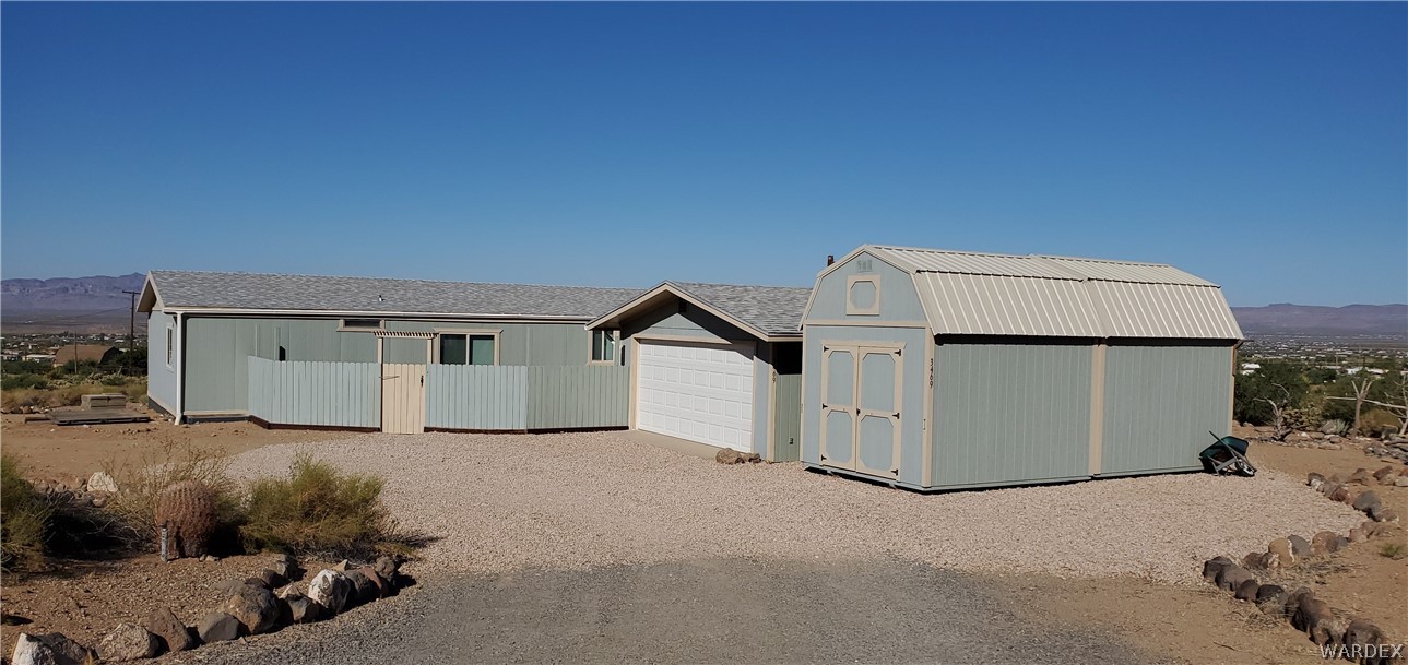3469 Kayenta Road Golden Valley, AZ 86413 - Photo 1 of 49 a view of a garage