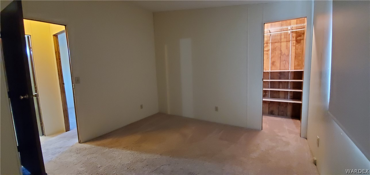 3469 Kayenta Road Golden Valley, AZ 86413 - Photo 29 of 49 an empty room with closet area