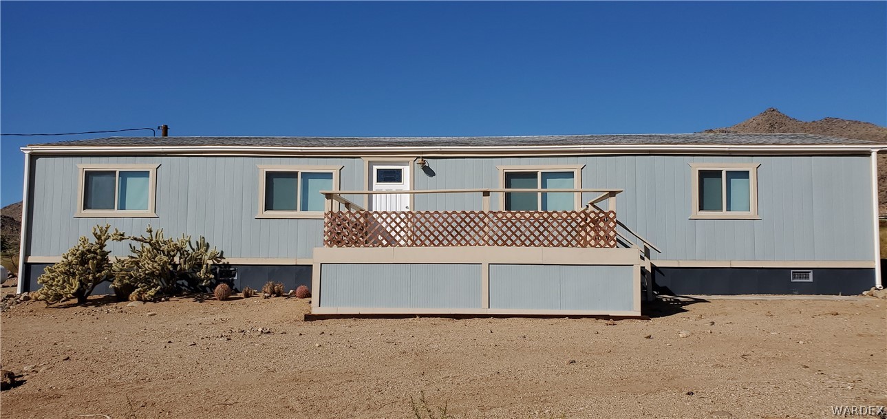 3469 Kayenta Road Golden Valley, AZ 86413 - Photo 3 of 49 a view of a house with a yard
