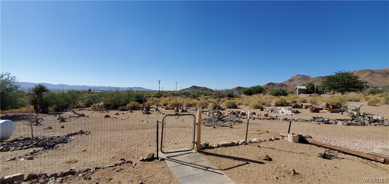 3469 Kayenta Road Golden Valley, AZ 86413 - Photo 49 of 49 a view of a lake with a beach
