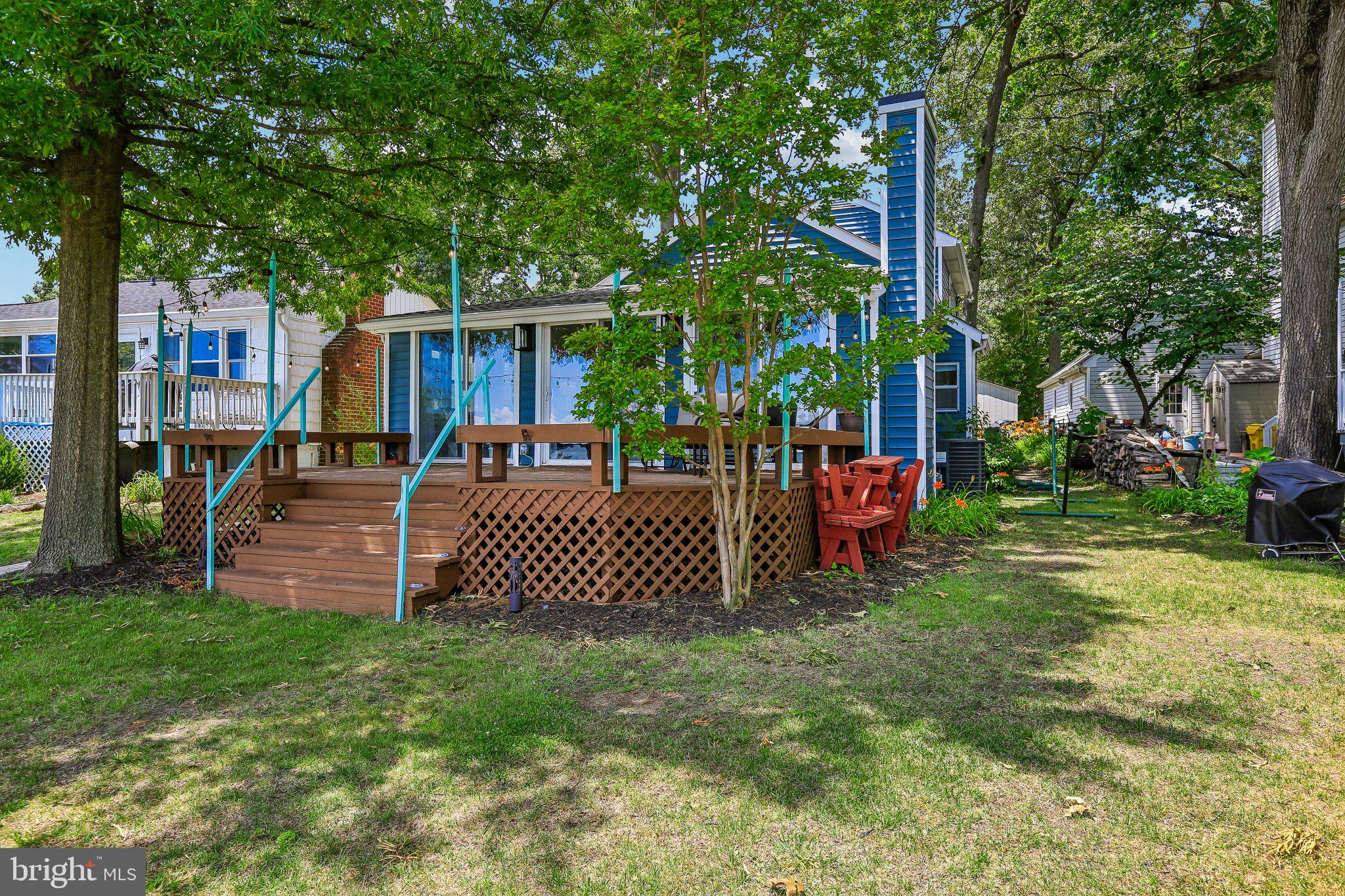 275 Gibson Road Pasadena, MD 21122 - Photo 31 of 59 Charming blue home with inviting deck.