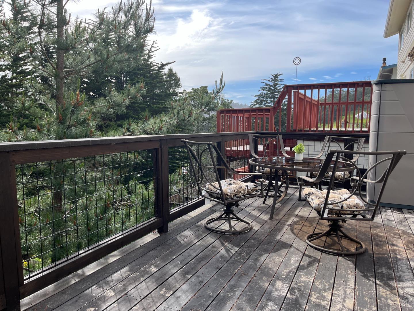 5 Malavear Court, Unit INLAW Pacifica, CA 94044 - Photo 12 of 13 a view of a chairs and table in the balcony