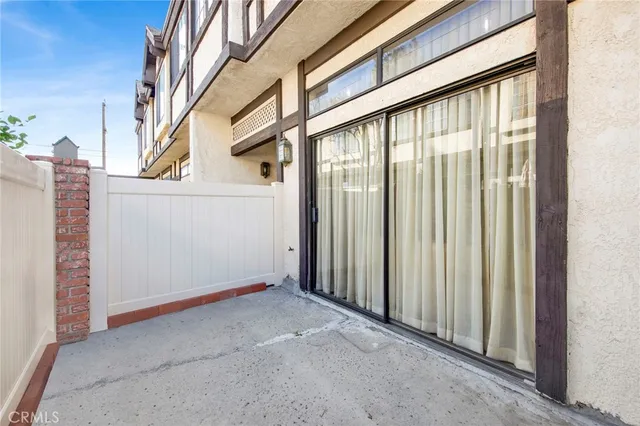 a view of a house with a street