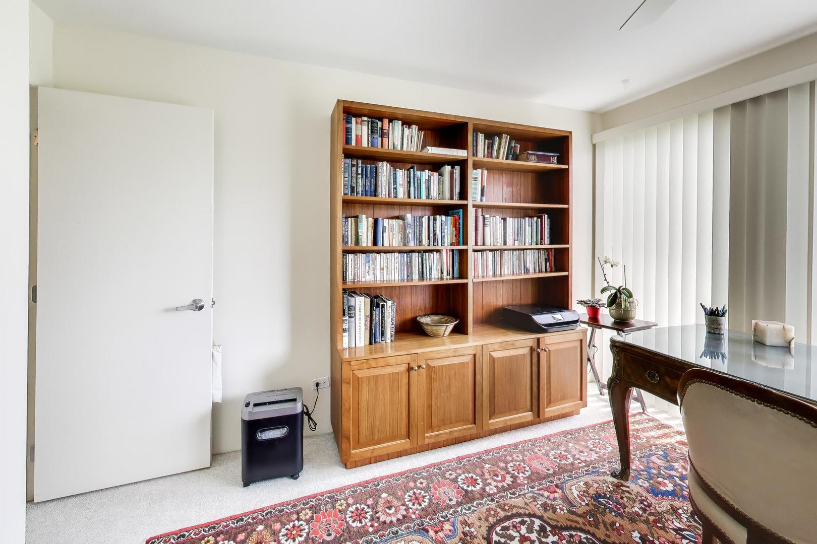 495 Milford Road Deerfield, IL 60015 - Photo 25 of 33 a view of a workspace with furniture and a window