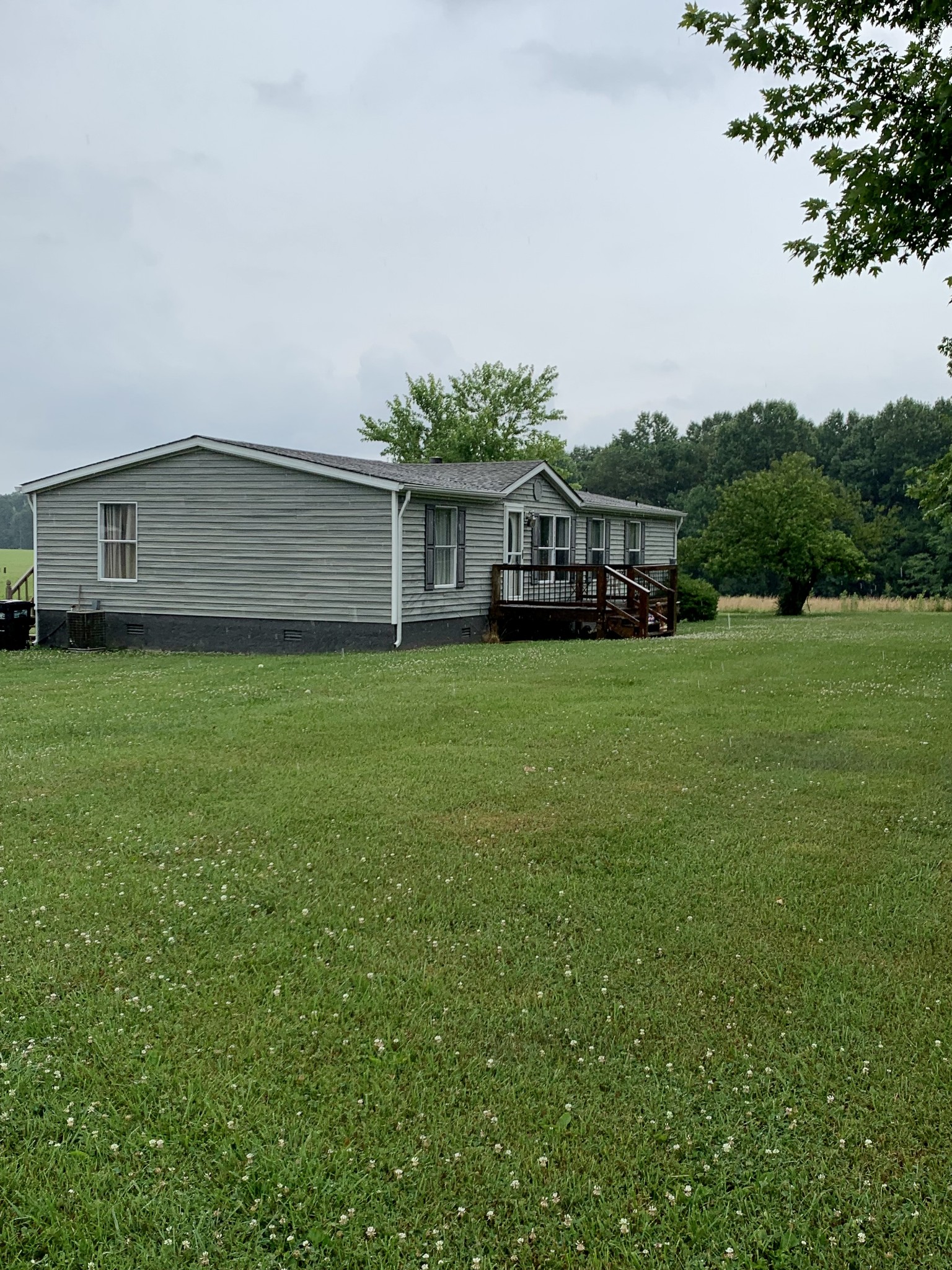 1145 Boyd Road Lafayette, TN 37083 - Photo 16 of 17 a front view of a house with a yard