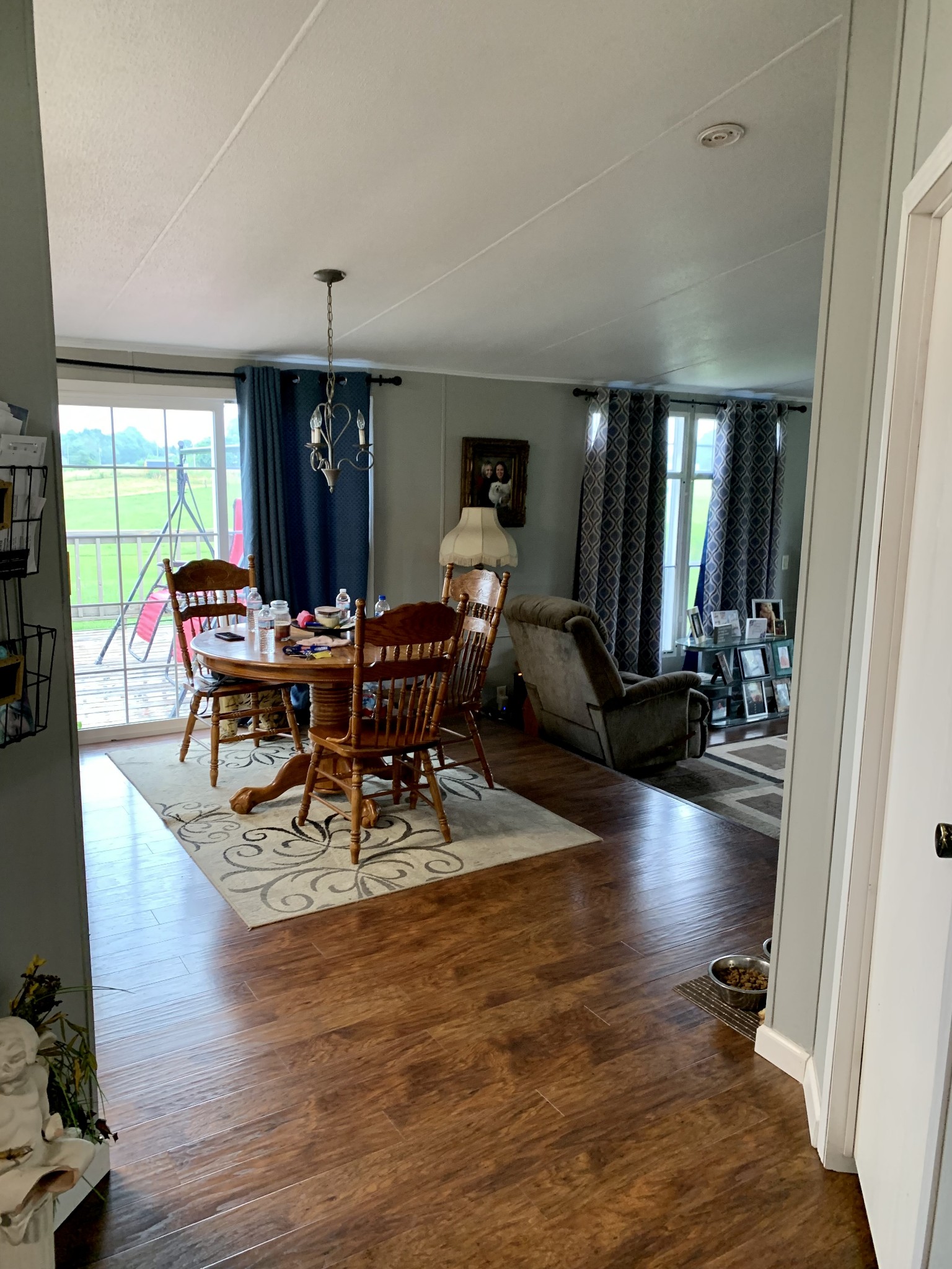 1145 Boyd Road Lafayette, TN 37083 - Photo 4 of 17 a view of a dining room with furniture window and wooden floor