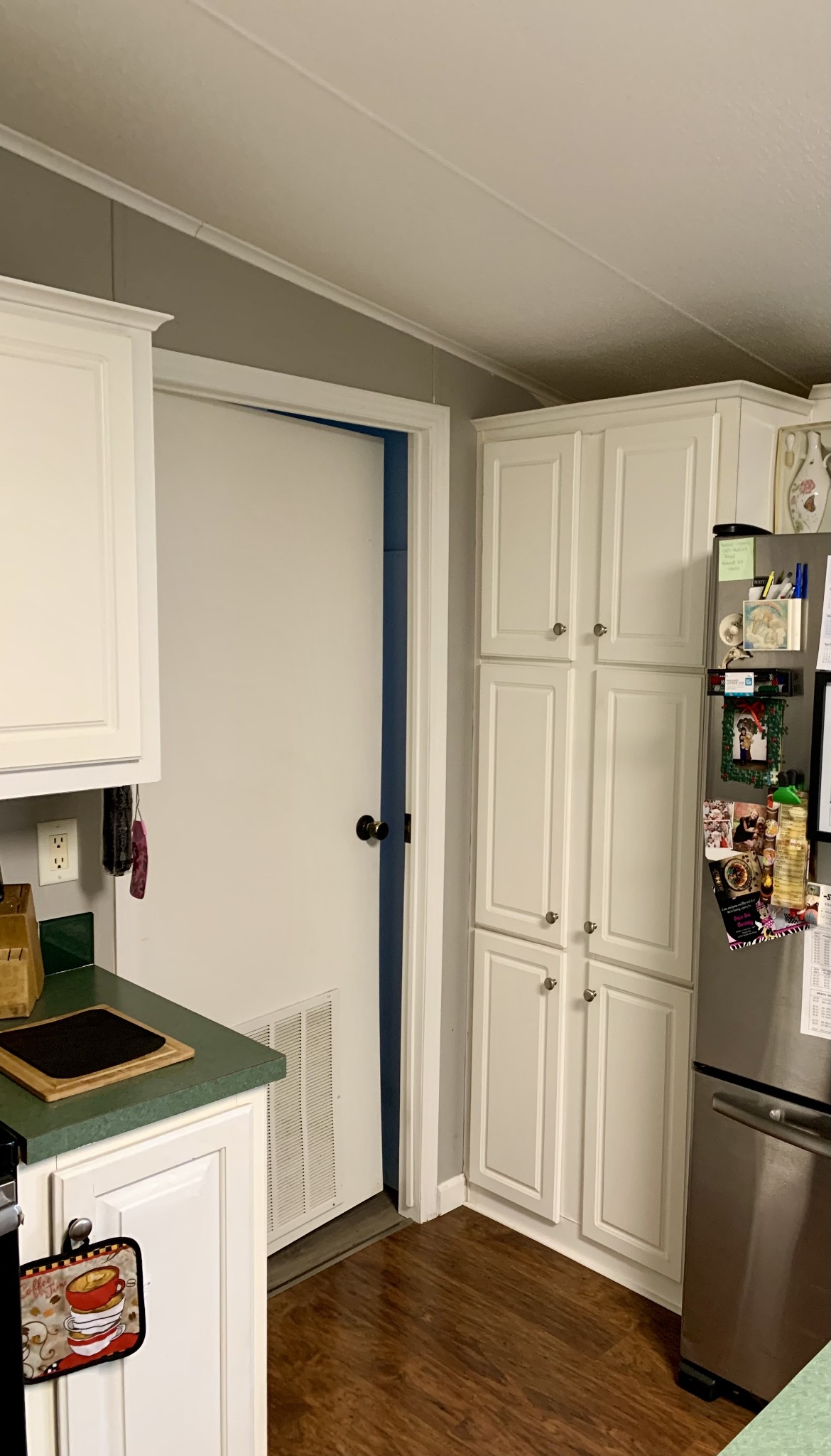 1145 Boyd Road Lafayette, TN 37083 - Photo 7 of 17 a kitchen with a refrigerator and a stove top oven