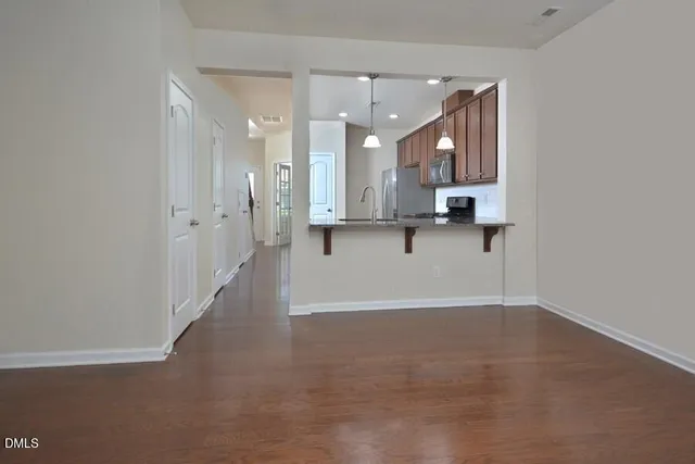 a view of a kitchen with a sink