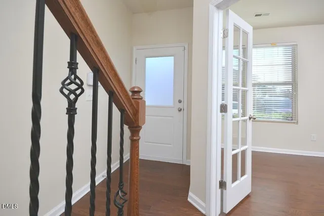 a view of an entryway with stairs