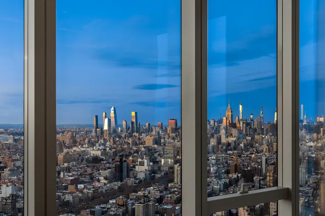 a room with furniture pool table and outdoor view