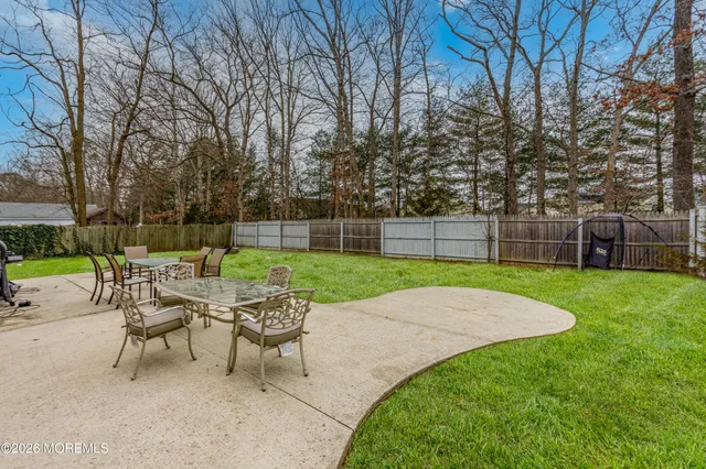 a view of yard with seating and green space