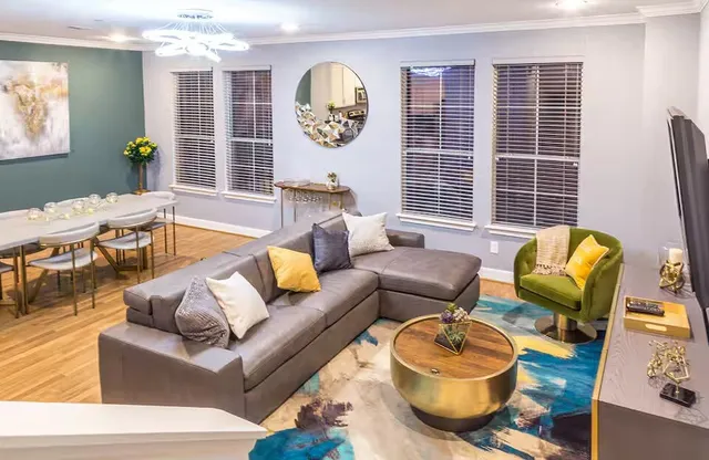 a living room with furniture and window