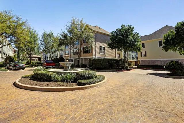 a house with palm tree in front of it