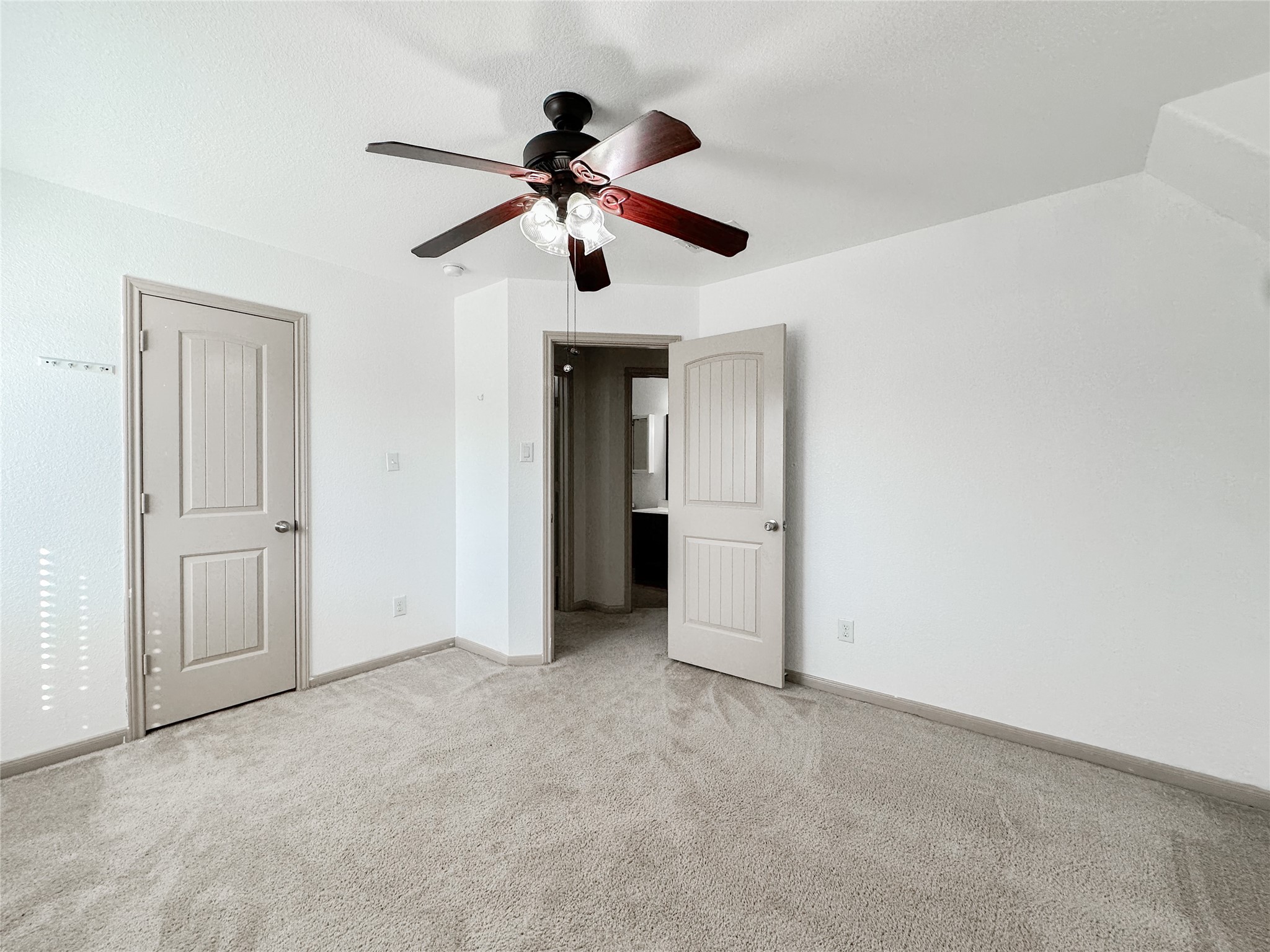20319 Little Wing Drive Spring, TX 77388 - Photo 43 of 49 a view of an empty room and chandelier fan