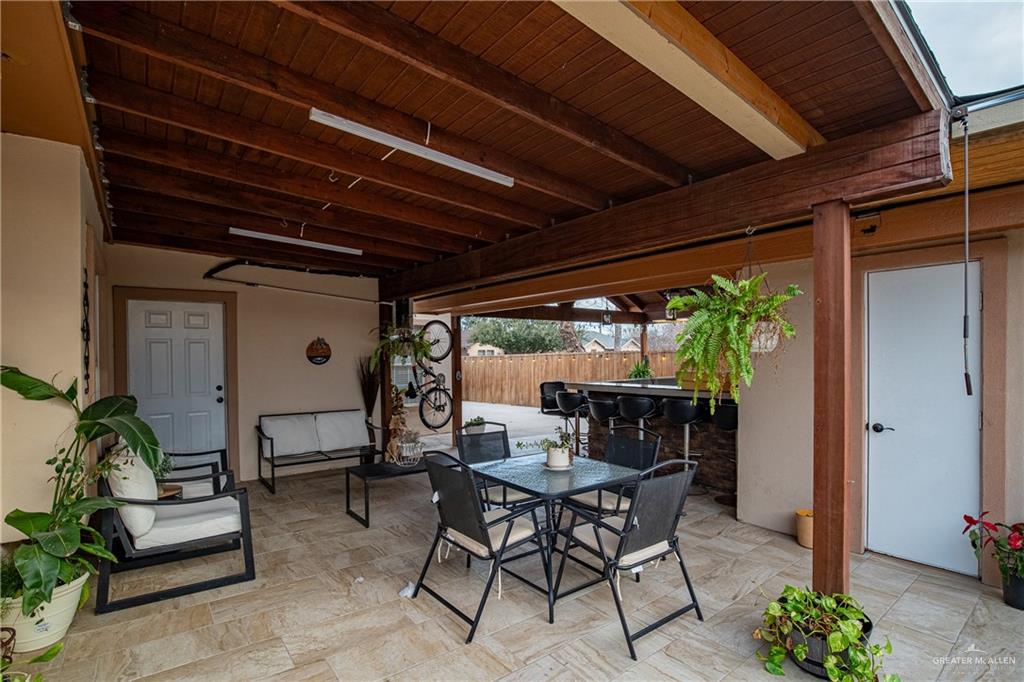 701 West Falcon Avenue Pharr, TX 78577 - Photo 19 of 24 a view of an outdoor dining space with a table and chairs