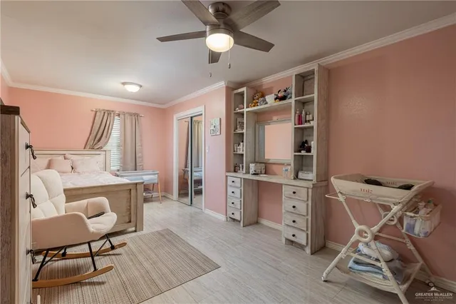 a kitchen with sink cabinets and wooden floor
