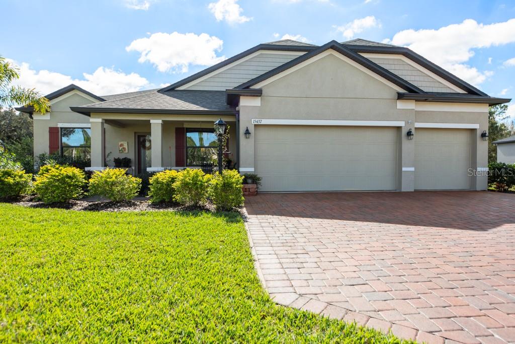 Pavered driveway, 3 Car Garage & Front porch