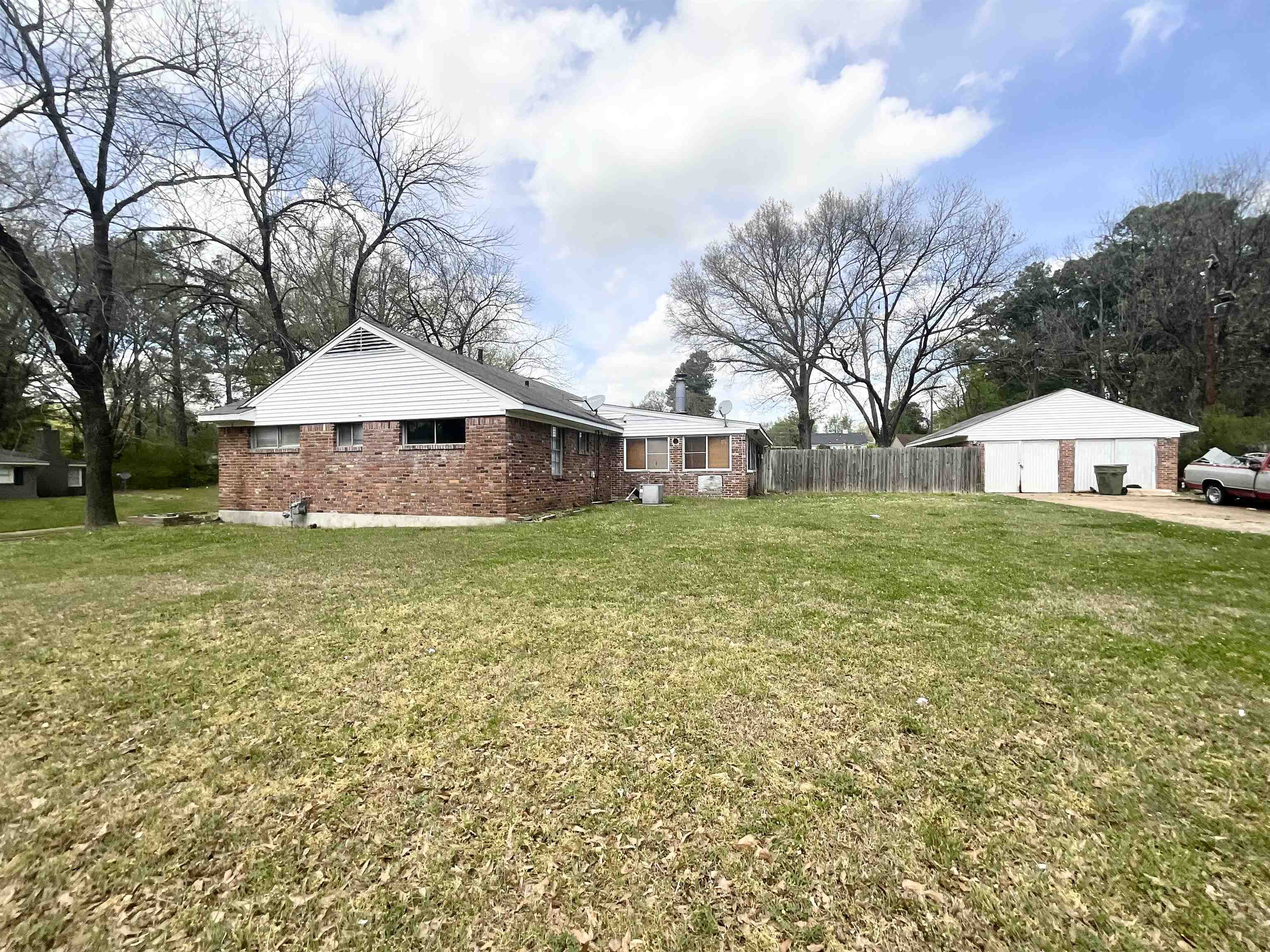 3370 Debby Street Memphis, TN 38127 - Photo 4 of 8 a view of a house with a yard